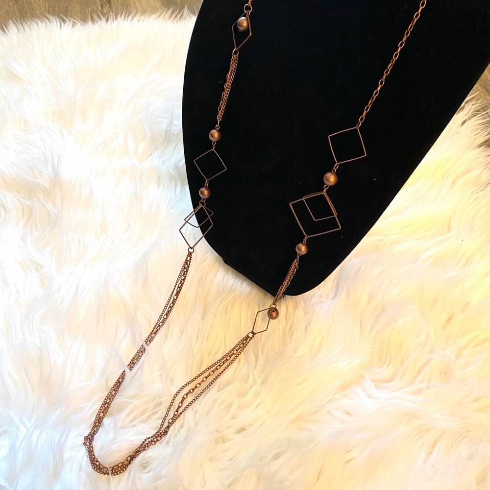 🔶 NWT Long copper look necklace